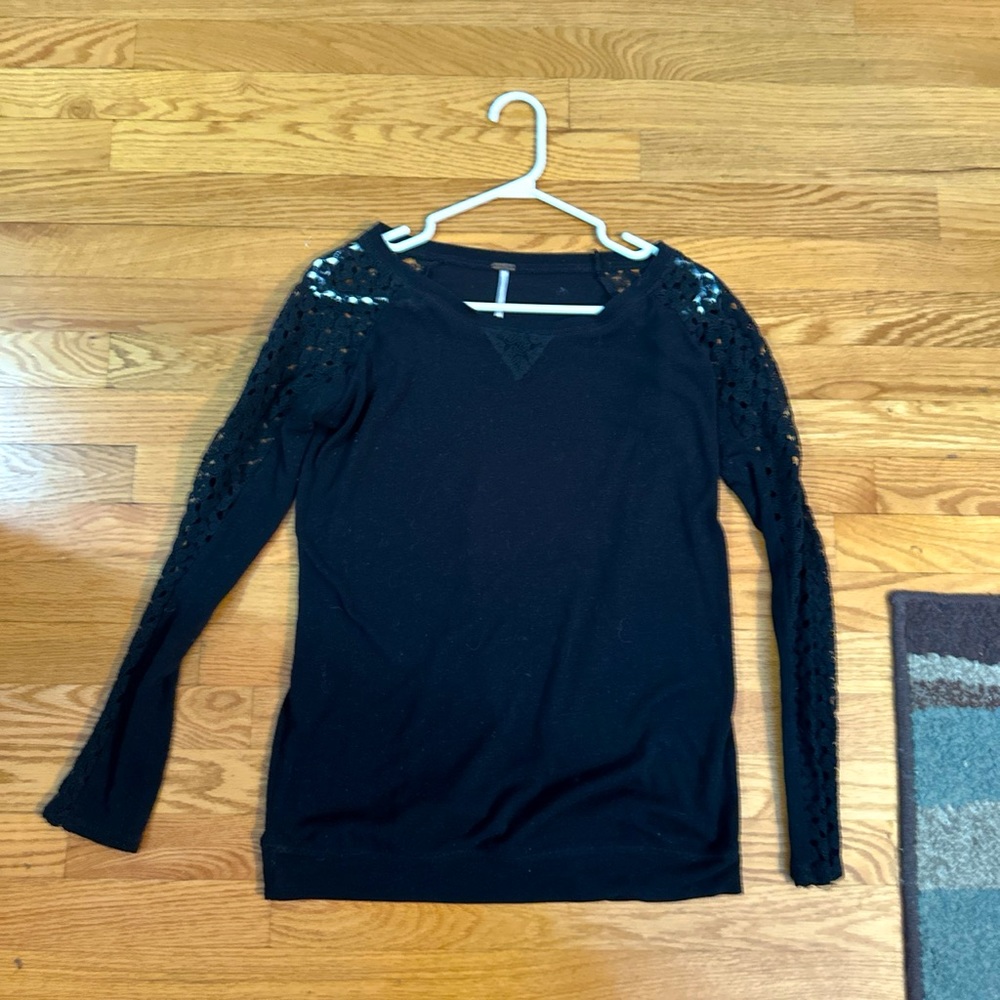 Poof’s medium black sweater.